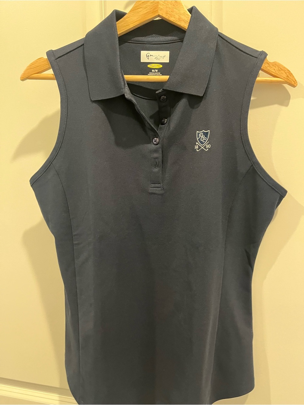 Navy Sleeveless Polo Top by Greg Norman Collection with PCC shield logo